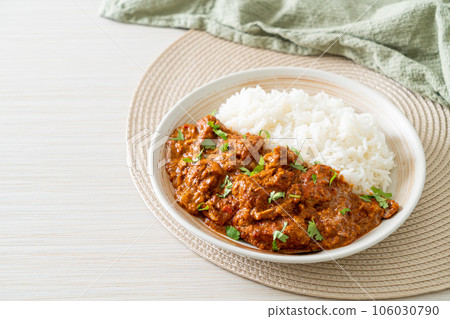 chicken tikka masala with rice on plate chicken tikka masala with rice on plate 106030790