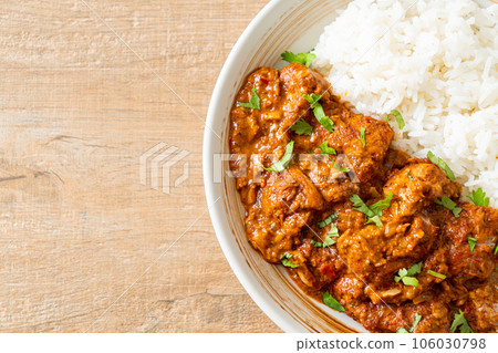 chicken tikka masala with rice on plate chicken tikka masala with rice on plate 106030798