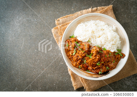 chicken tikka masala with rice on plate chicken tikka masala with rice on plate 106030803