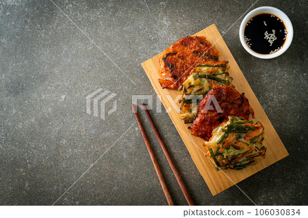 Pajeon or Korean pancake and Korean Kimchi pancake or Kimchijeon on white background 106030834