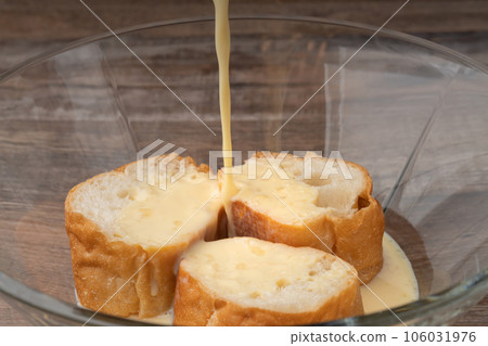 French toast dipped in egg mixture French toast dipped in egg mixture 106031976