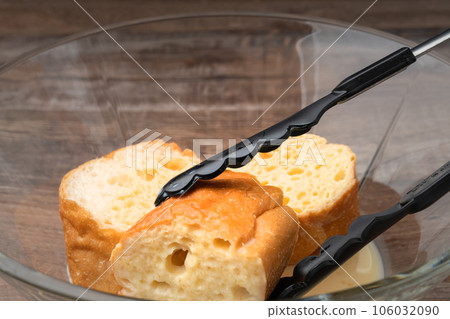 French toast dipped in egg mixture 106032090