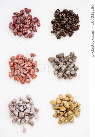 Chocolates pebble. Chocolate candies shaped rock. 106032180