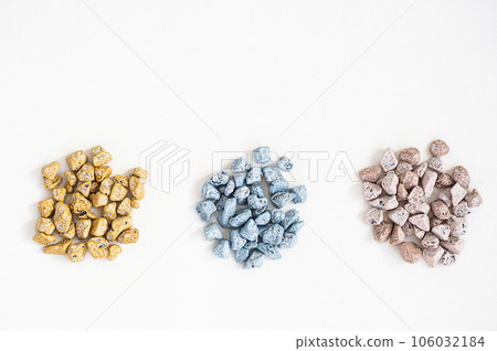 Chocolates pebble. Chocolate candies shaped rock. 106032184
