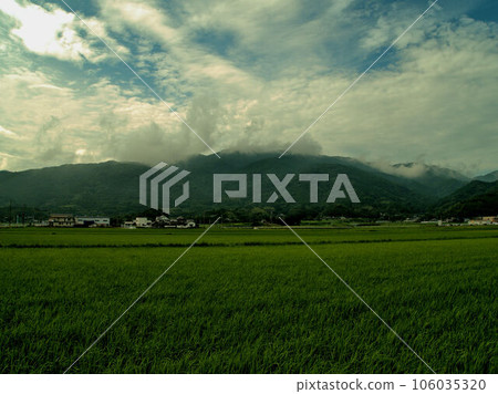 Rural scenery of Itoshima with rising air currents in the mountains Rural scenery of Itoshima with rising air currents in the mountains 106035320
