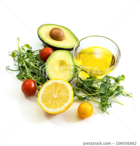 Ingredients of healthy food. Micro green pea sprouts, olive oil, tomato, avocado, lemon. Ketogenic low carbs diet concept. Isolated on a white background Ingredients of healthy food. Micro green pea sprouts, olive oil, tomato, avocado, lemon. Ketogenic low carbs diet concept. Isolated on a white background 106036862
