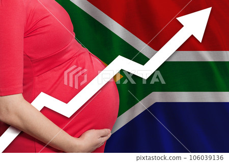 Pregnant woman on flag of South African Republic background. Birth rate up 106039136