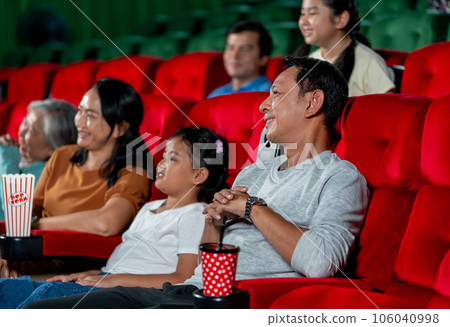 Close up Asian family with father, mother, grandmother and daughter enjoy and happy  106040998