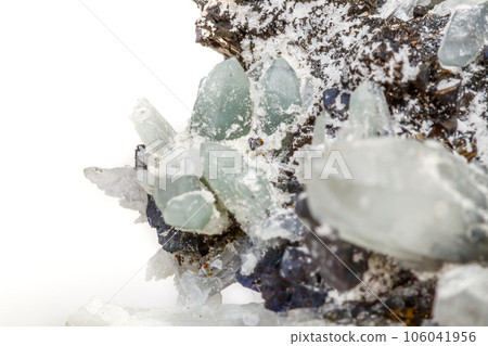 Macro mineral stone Drusus quartz with sphalerite in the rock a white background 106041956