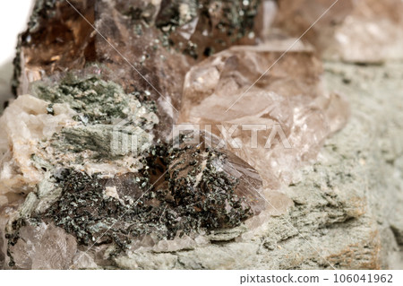 Macro mineral stone quartz chlorite Palygorskite rock on a white background 106041962