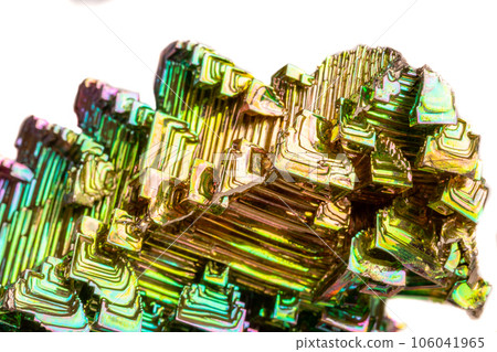 Macro of the mineral bismuth stone on a white background 106041965