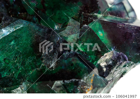 Macro mineral stone Fluorite on a white background 106041997