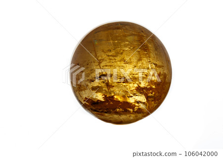 Macro mineral stone Calcite orb on a white background 106042000
