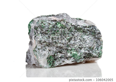 Macro mineral stone Fuchsite on a white background 106042005