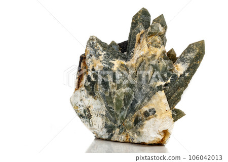 Macro mineral stone Quartz Hedenbergite Prase on ilvite on a white background 106042013