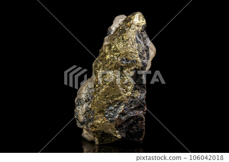 Macro of a mineral stone Sphalerite with fluorite and pyrite on a black background Macro of a mineral stone Sphalerite with fluorite and pyrite on a black background 106042018