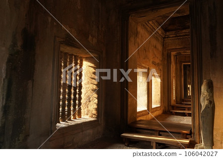 Corridor of Angkor Wat in the evening Corridor of Angkor Wat in the evening 106042027