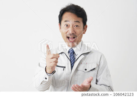 Middle-aged worker flashing white background 106042123