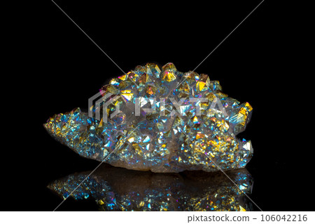 Macro mineral stone Titanium Quartz, Flame Aura Quartz on a black background 106042216