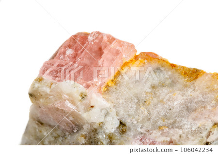 Macro of the mineral stone Rhodochrosite on a white background 106042234