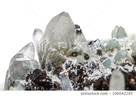Macro mineral stone Drusus quartz with sphalerite in the rock a white background 106042285