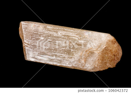 Macro mineral stone Spodumene on a black background Macro mineral stone Spodumene on a black background 106042372