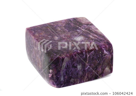 Macro mineral stone Charoite on a white background Macro mineral stone Charoite on a white background 106042424