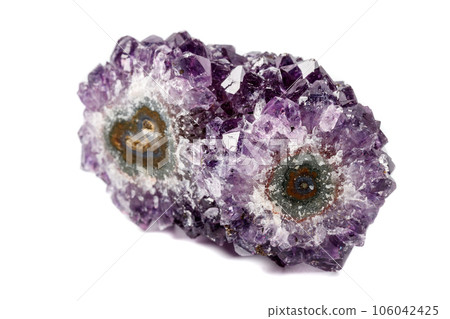 Macro mineral stone Amethysts eye crystals on white background 106042425