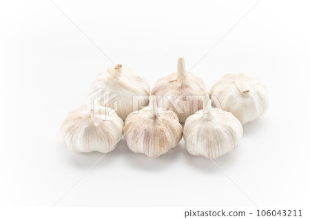 garlic placed on a white background. 106043211