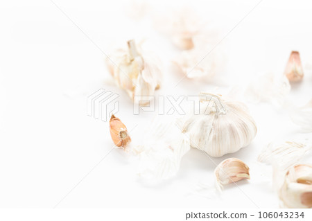 garlic placed on a white background. garlic placed on a white background. 106043234