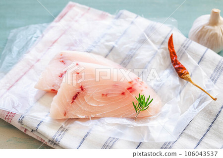 Uncooked swordfish fillet Uncooked swordfish fillet 106043537