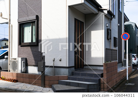 The entrance of a newly built detached house The entrance of a newly built detached house 106044311