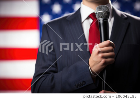 Confident Gentleman Speaking Against US Flag 106045183