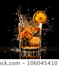 whiskey with ice cubes and slice of lemon on black background 106045410