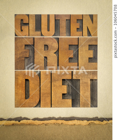 gluten free diet word abstract - text in letterpress wood type against art paper, healthy eating concept 106045708
