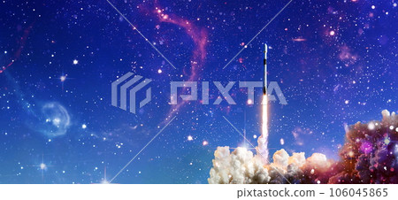 Shuttle launch in the clouds to outer space. Dark space with stars on background.Spaceship flight. Elements of this image furnished by NASA Shuttle launch in the clouds to outer space. Dark space with stars on background.Spaceship flight. Elements of this image furnished by NASA 106045865