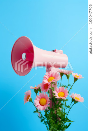 Pink megaphone sitting on top of bouquet of pink daisies. Generative AI 106047706