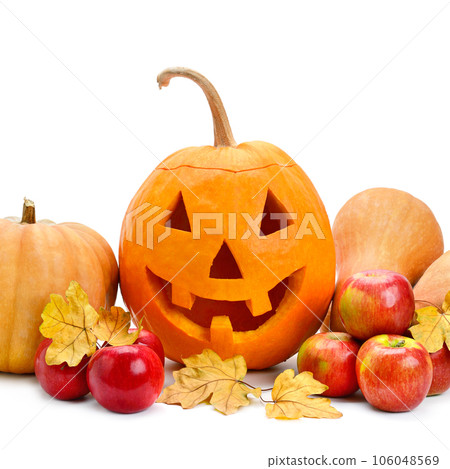 Pumpkin head, apples and yellow maple leaves isolated on white . Halloween holiday. Pumpkin head, apples and yellow maple leaves isolated on white . Halloween holiday. 106048569