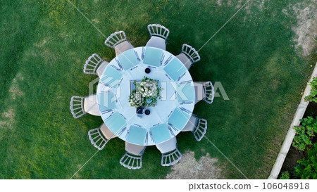 aerial view of tables and chairs in country wedding hall 106048918