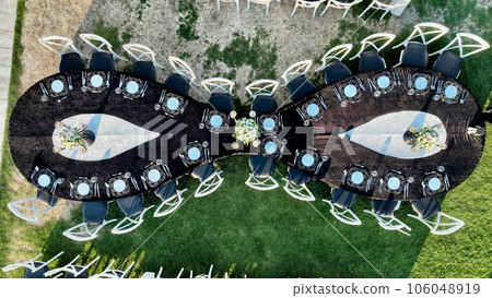 aerial view of tables and chairs in country wedding hall aerial view of tables and chairs in country wedding hall 106048919