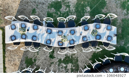 aerial view of tables and chairs in country wedding hall 106048927