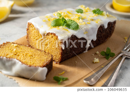 Lemon drizzle loaf cake, homemade sponge soft cake with sugar icing 106049635