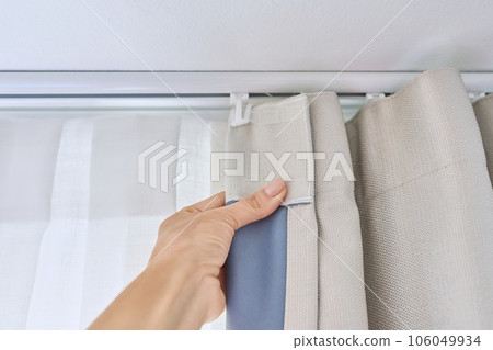 Ceiling cornice in two rows with curtains close-up Ceiling cornice in two rows with curtains close-up 106049934