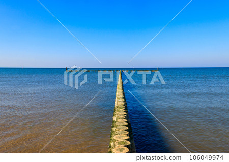 Wooden breakwater in the Baltic sea, Poland Wooden breakwater in the Baltic sea, Poland 106049974