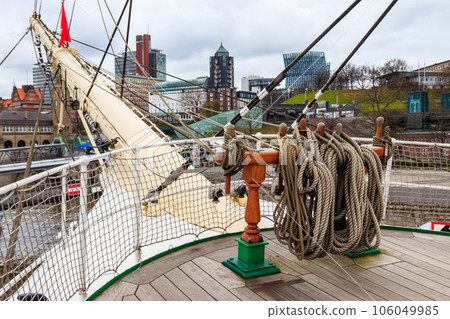 Nautical ropes on a deck of a large ship Nautical ropes on a deck of a large ship 106049985