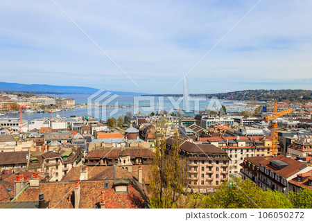 Panoramic view of city of Geneva, Lake Geneva and Jet d'Eau fountain in Switzerland. View from the bell tower of Saint Pierre Cathedral Panoramic view of city of Geneva, Lake Geneva and Jet d'Eau fountain in Switzerland. View from the bell tower of Saint Pierre Cathedral 106050272