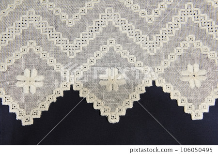 Embroidery with white lace Embroidery with white lace 106050495