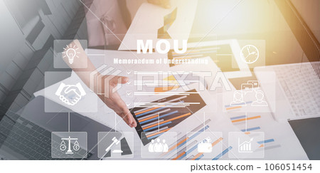 MOU - memorandum of understanding business concept, business Partner handshake nonbinding agreement that states each party's intentions to take action, conduct business transaction, new partnership. 106051454