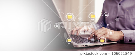 Business people using laptop with cloud computing system , Storage and data transfer Cloud network, Cloud technology. Networking and internet service, sharing download and upload and internet service Business people using laptop with cloud computing system , Storage and data transfer Cloud network, Cloud technology. Networking and internet service, sharing download and upload and internet service 106051849