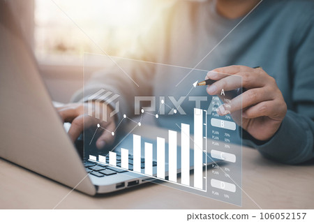 US IRS 1040 form or  US Individual income tax Concept,accountant holding pen working on calculator business with data accounting documents and a laptop, pay tax in 2023 years,new year 2023 tax concept 106052157